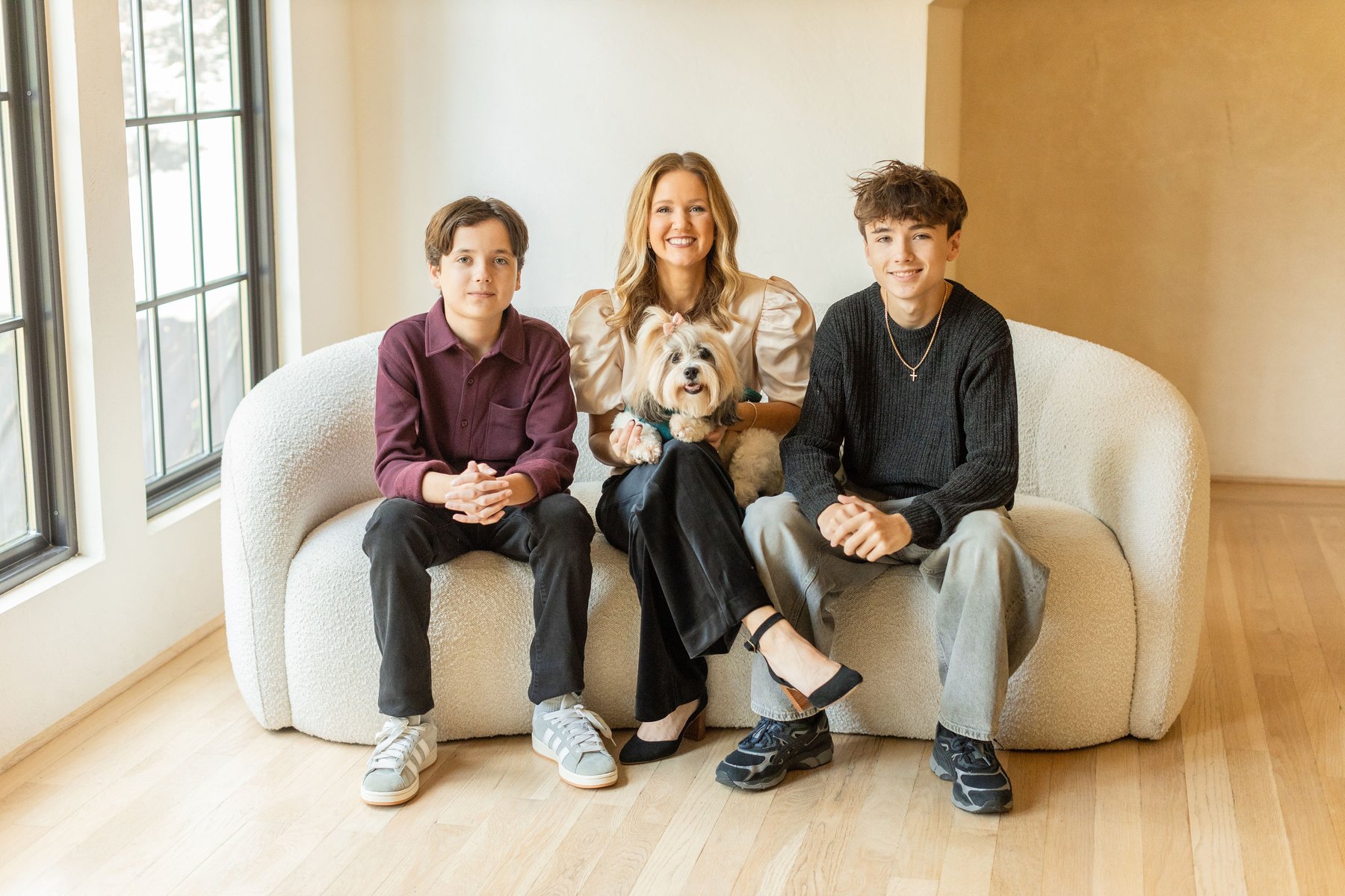 Luann Riley at home with her twin sons, Beckett and Eli, and their dog, Luna